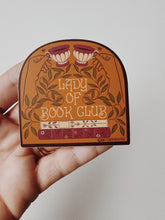 Load image into Gallery viewer, Vintage-style vinyl matte sticker depicting a lady enjoying tea time, perfect for book club enthusiasts.