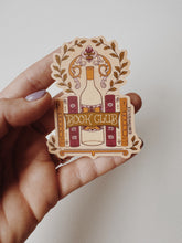 Load image into Gallery viewer, Playful vinyl matte sticker combining book club themes with a glass of wine in a vintage design.