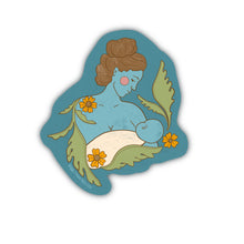 Load image into Gallery viewer, Tender vinyl matte sticker featuring a mother cradling her baby, illustrated with soft vintage colors and emotional warmth.