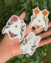 Load image into Gallery viewer, Delicate sticker illustrating a woman’s torso with blooming wildflowers in vintage style—celebrating body positivity and nature’s strength.
